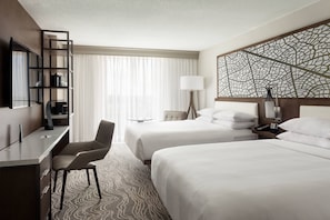 Down duvets, pillow-top beds, in-room safe, desk