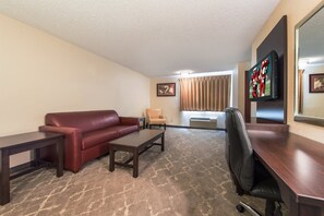 Suite, 1 King Bed with Sofa bed (Smoke Free) | Blackout drapes, iron/ironing board, free WiFi, bed sheets