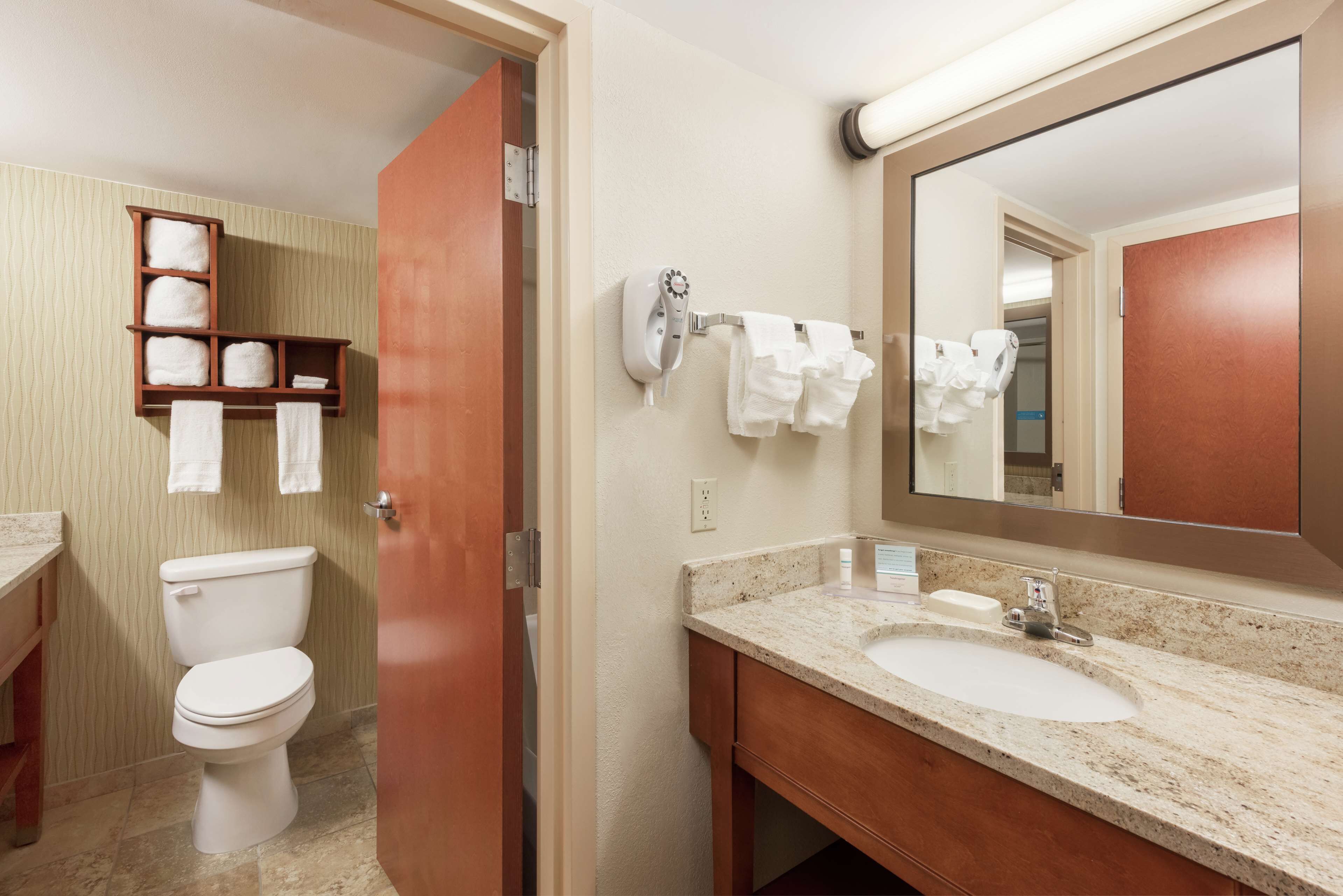 combined shower/bathtub, free toiletries, hair dryer, towels