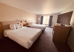 Down duvets, pillow-top beds, desk, laptop workspace