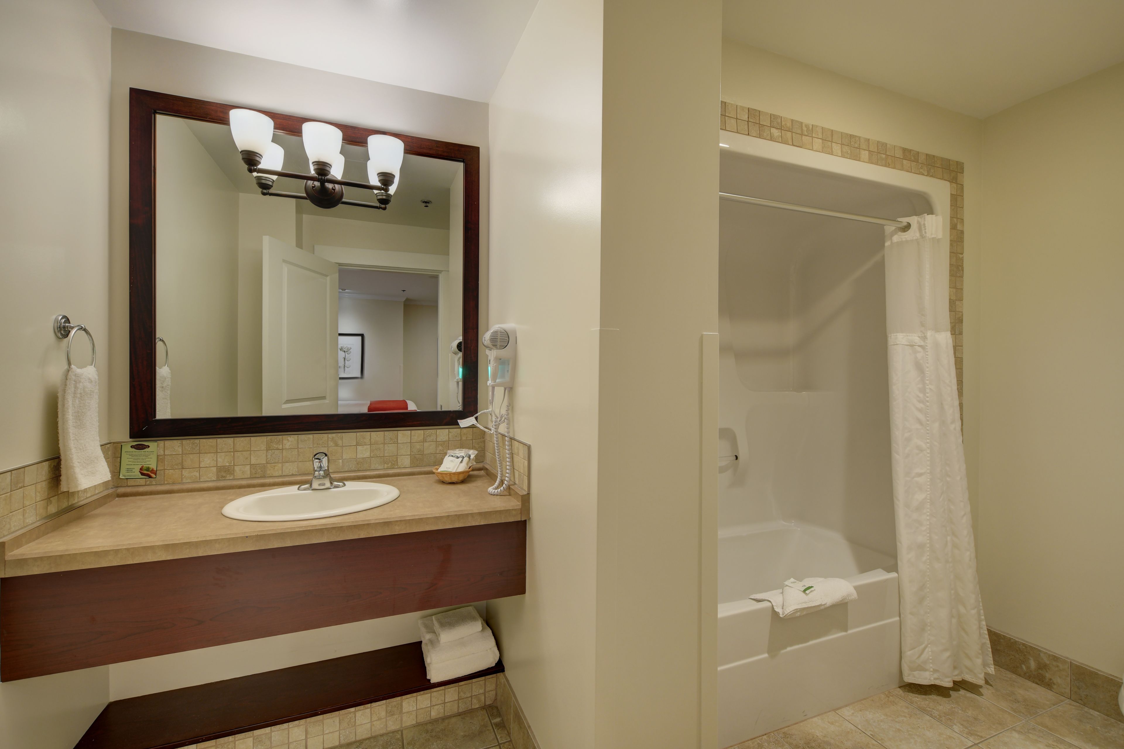 room, 2 queen beds | bathroom | free toiletries, hair dryer, towels, soap