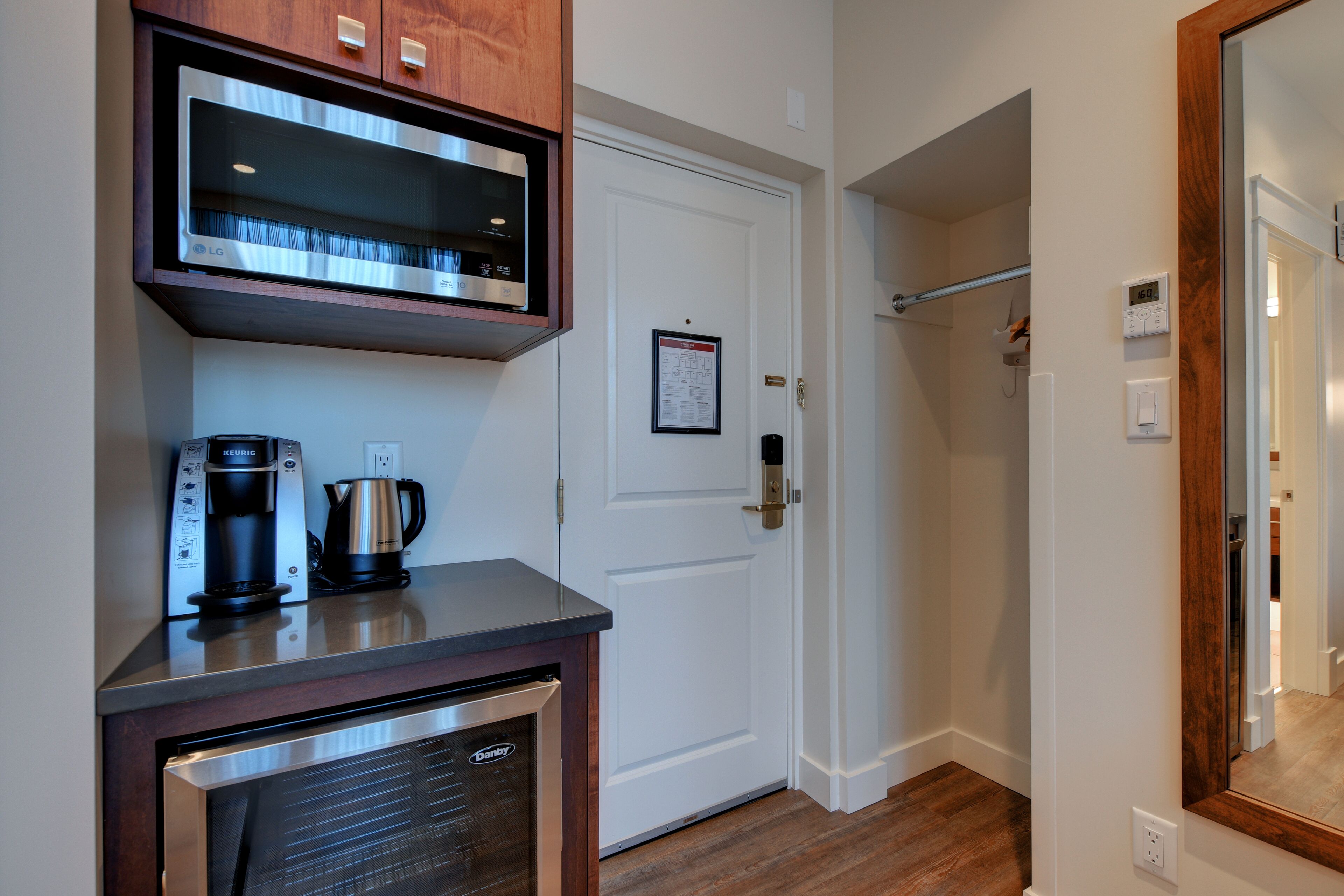 premium room, 1 queen bed, city view | minibar, in-room safe, blackout curtains, iron/ironing board