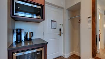 A kitchen with an LG microwave, Keurig coffee maker, and a Danby refrigerator.