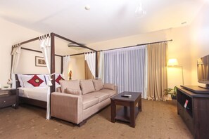 Junior Suite Village View | Minibar, individually decorated, individually furnished, desk