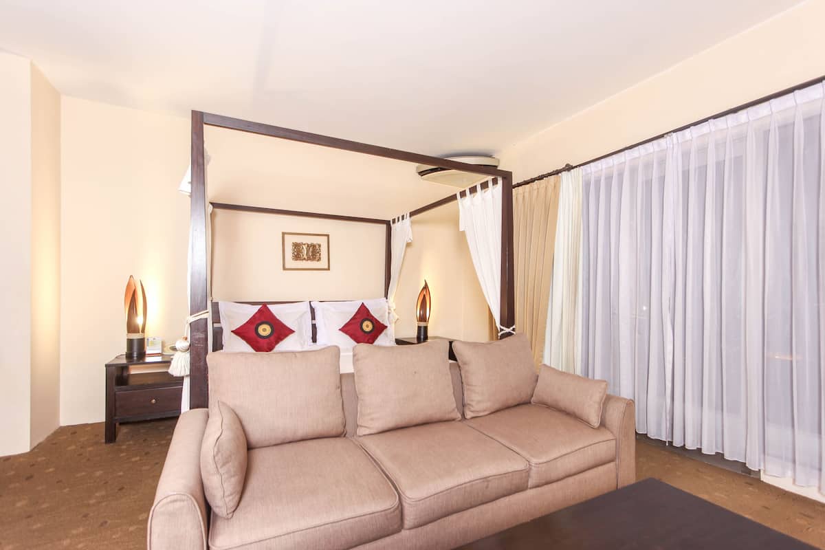 Junior Suite Village View | 1 bedroom, minibar, individually decorated, individually furnished