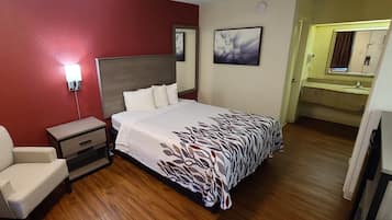 Deluxe Room, 1 Queen Bed, Non Smoking | Desk, iron/ironing board, WiFi (free), alarm clocks