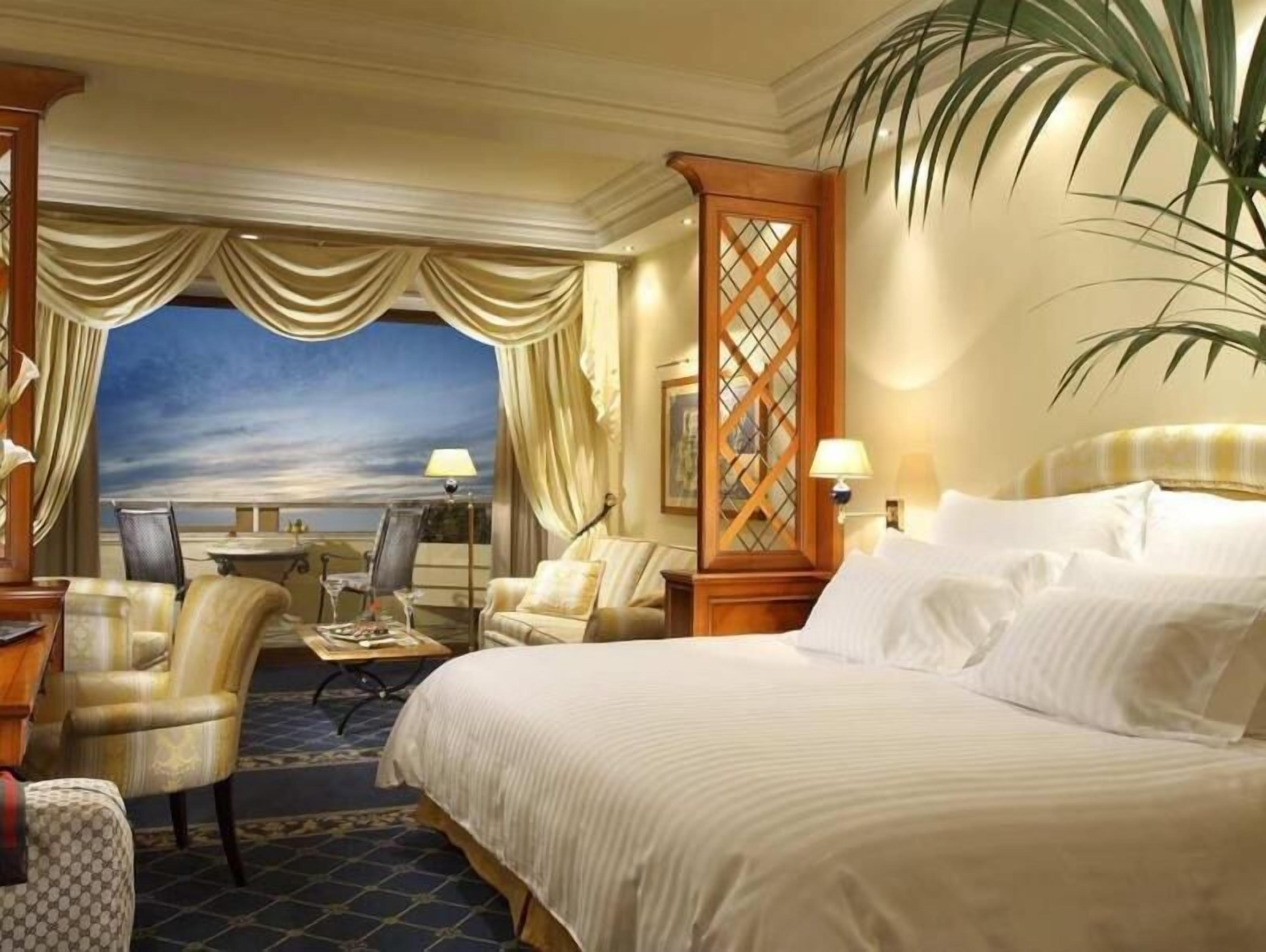 Premium bedding, down comforters, minibar, in-room safe