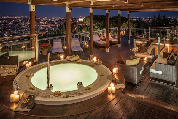 Signature Suite, 1 King Bed (Planetarium Suite, Spa/Lounge Access) | Bathroom | Combined shower/tub, designer toiletries, hair dryer, bathrobes