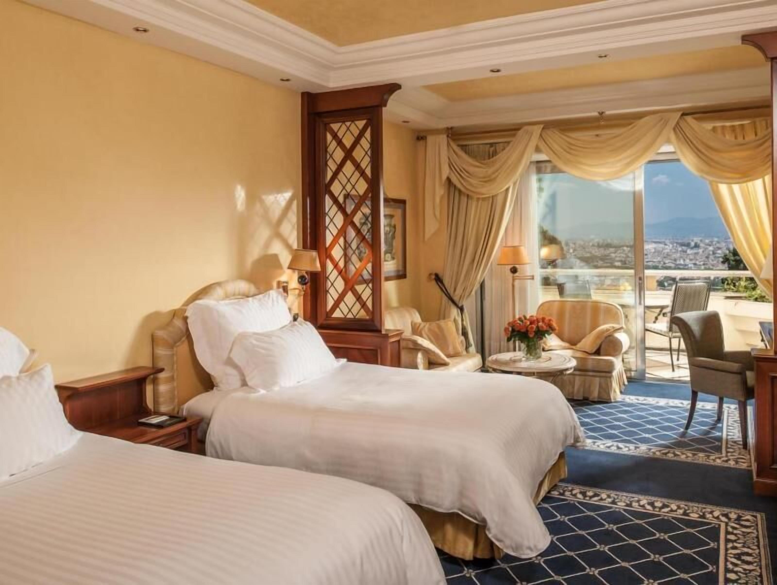 Premium bedding, down comforters, minibar, in-room safe