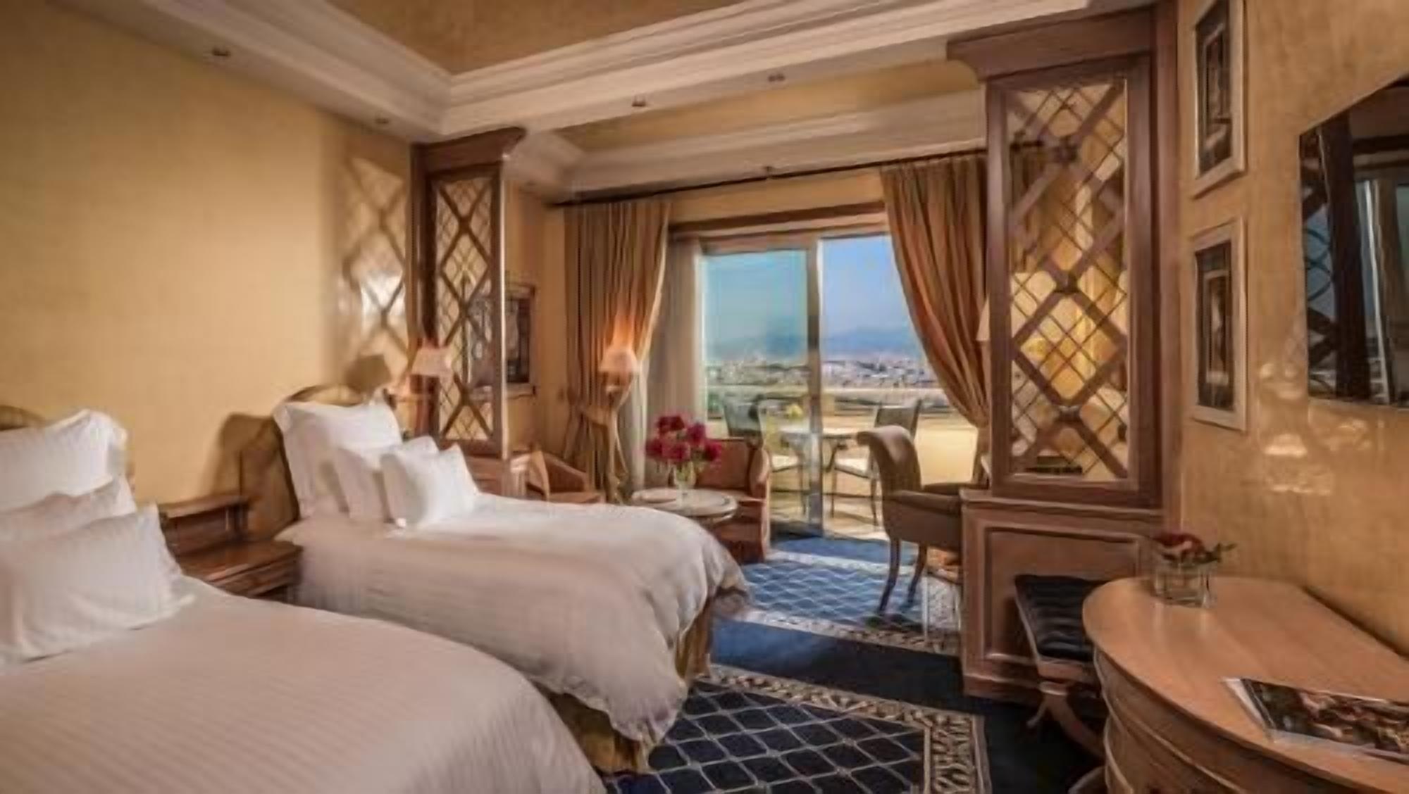 Premium bedding, down comforters, minibar, in-room safe