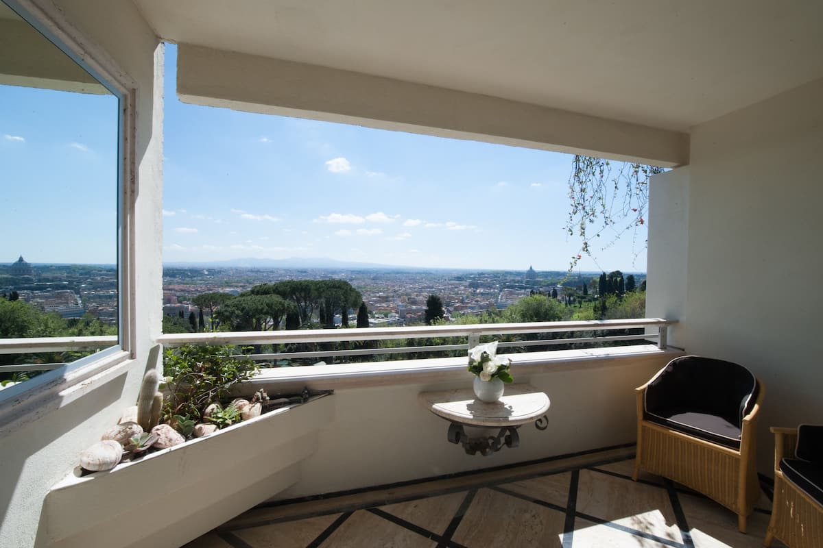 premium suite, 1 king bed, business lounge access (rome view) | balcony