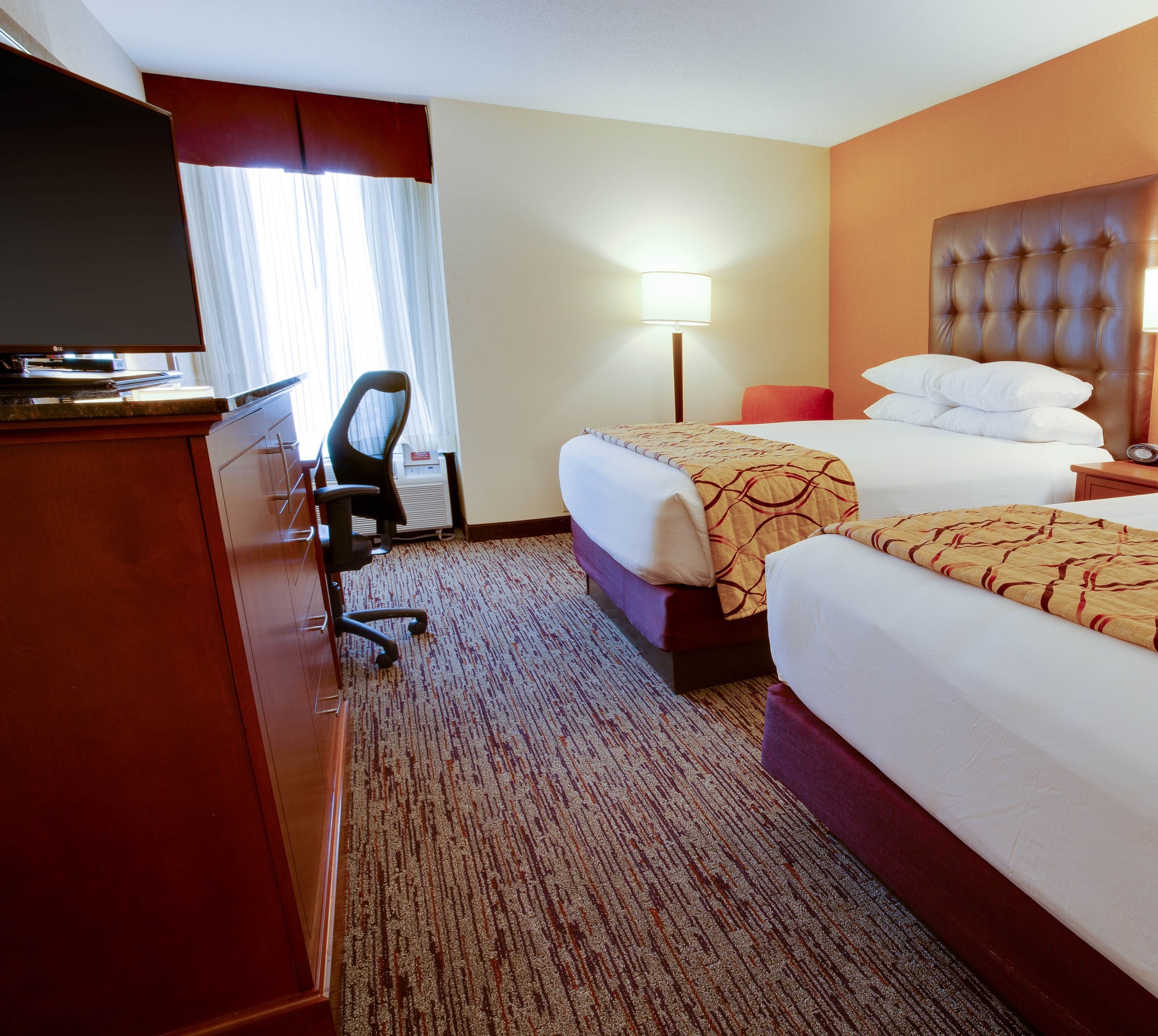 desk, blackout curtains, iron/ironing board, free cots/infant beds