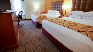 A hotel room with two beds, a TV, a desk, and a chair. - Drury Inn & Suites Terre Haute (Terre Haute)