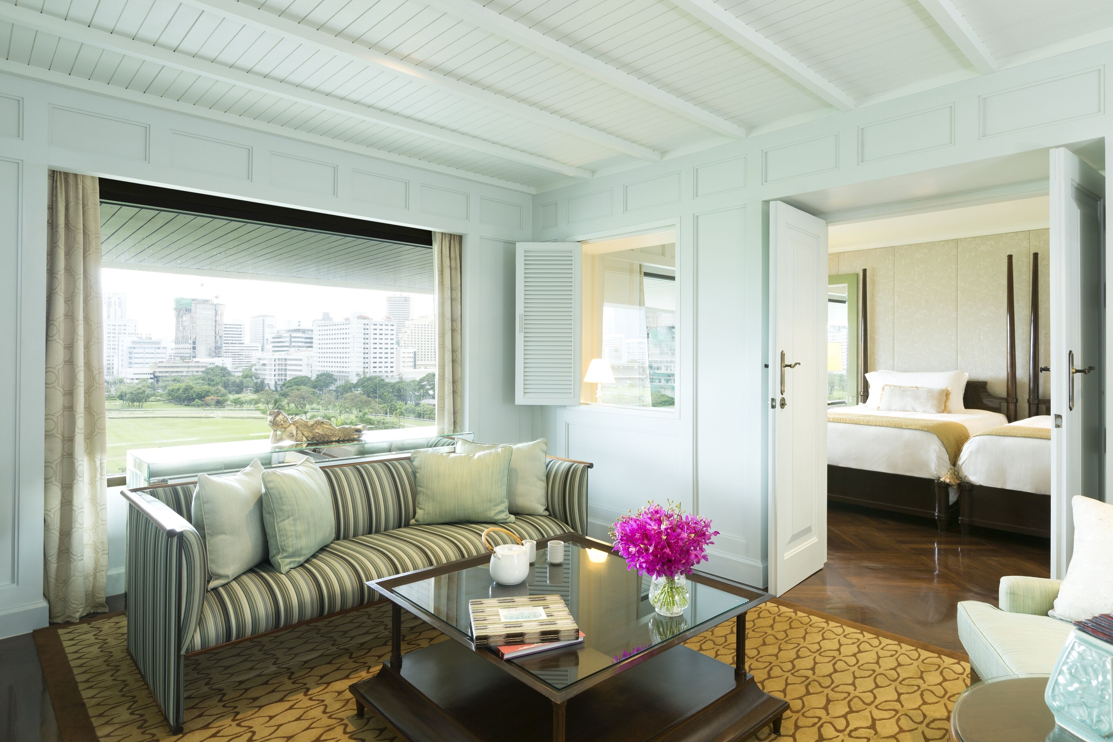 two bedroom jim thompson explorer suite  | living room | 42-inch lcd tv with satellite channels, tv, dvd player