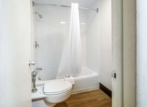 Standard Room, 2 Queen Beds, Non Smoking | Bathroom | Combined shower/tub, free toiletries, hair dryer, towels