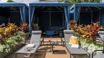 Outdoor pool, pool umbrellas, sun loungers