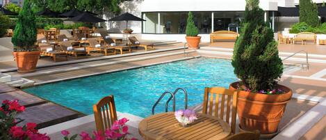 Outdoor pool, pool umbrellas, pool loungers