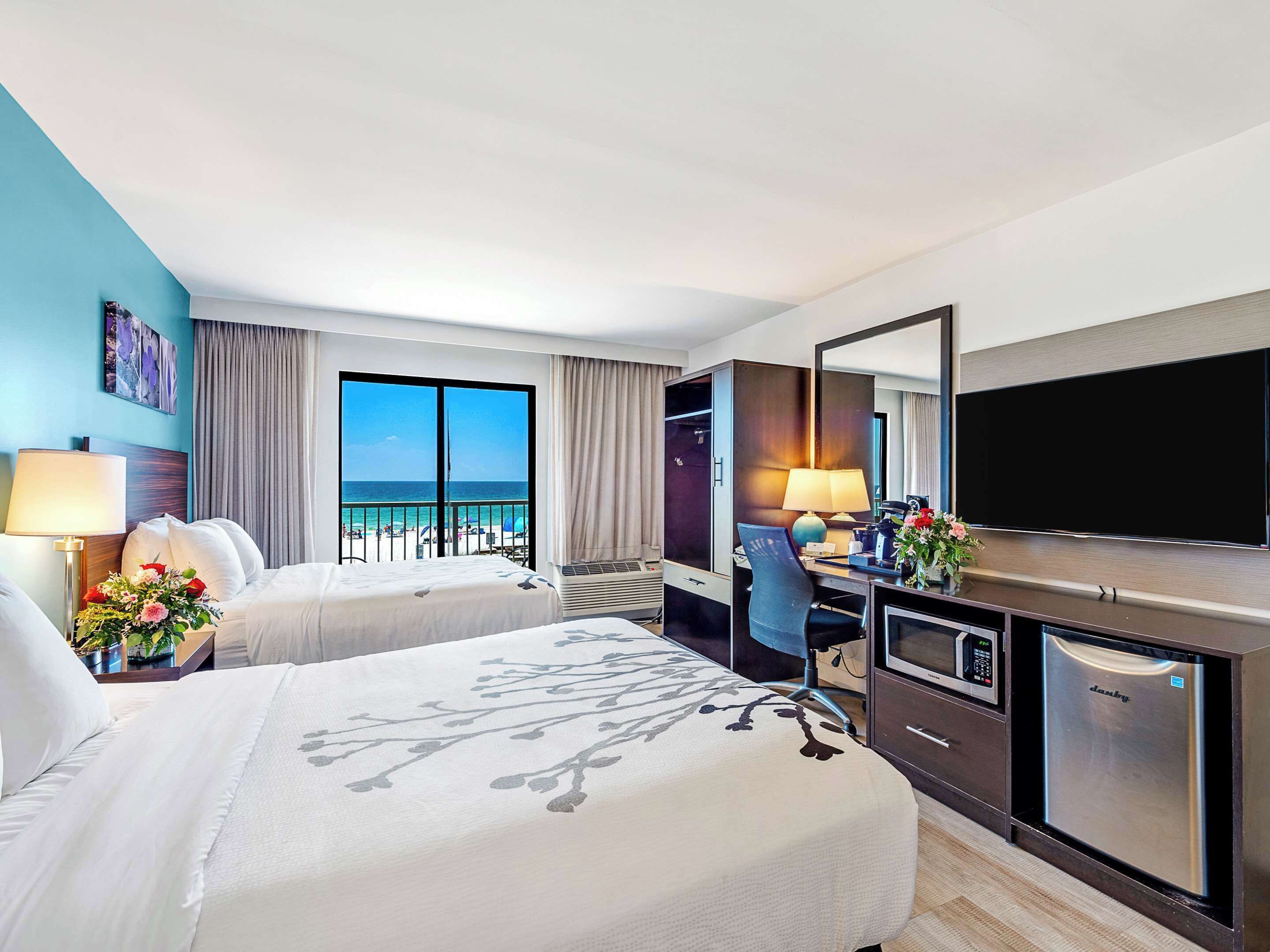 room, 2 double beds (gulf view) | premium bedding, desk, blackout curtains, iron/ironing board