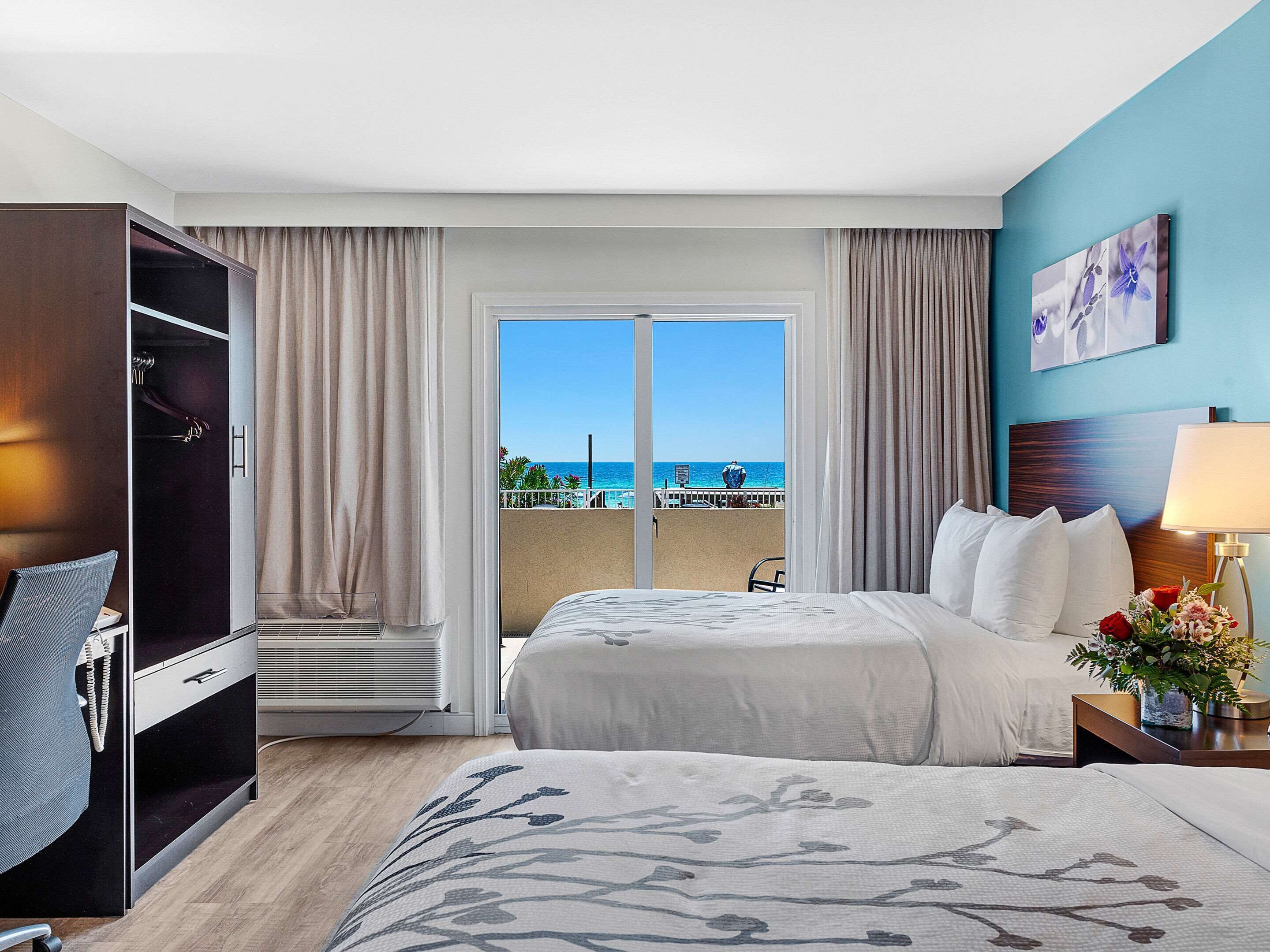 premium bedding, desk, blackout curtains, iron/ironing board