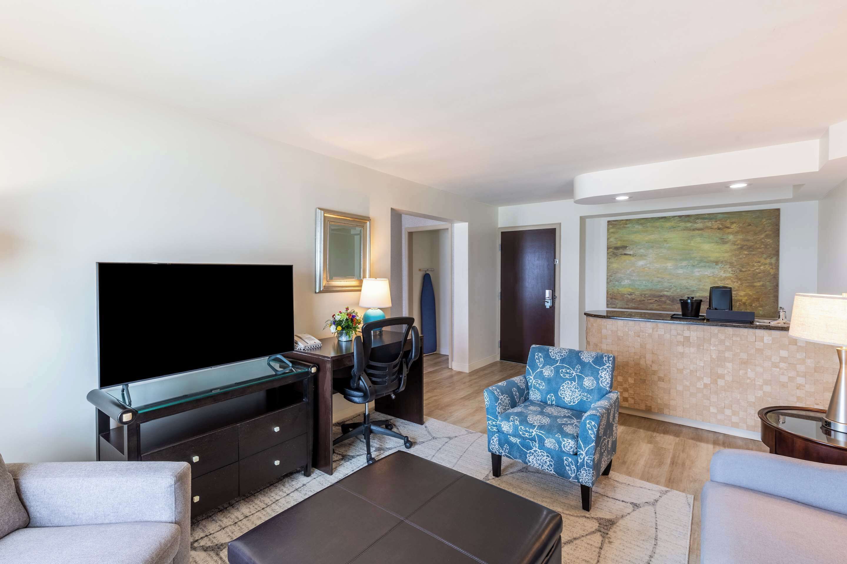 premium bedding, desk, blackout curtains, iron/ironing board