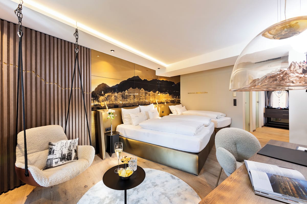 triple room, multiple beds | premium bedding, in-room safe, desk, blackout curtains