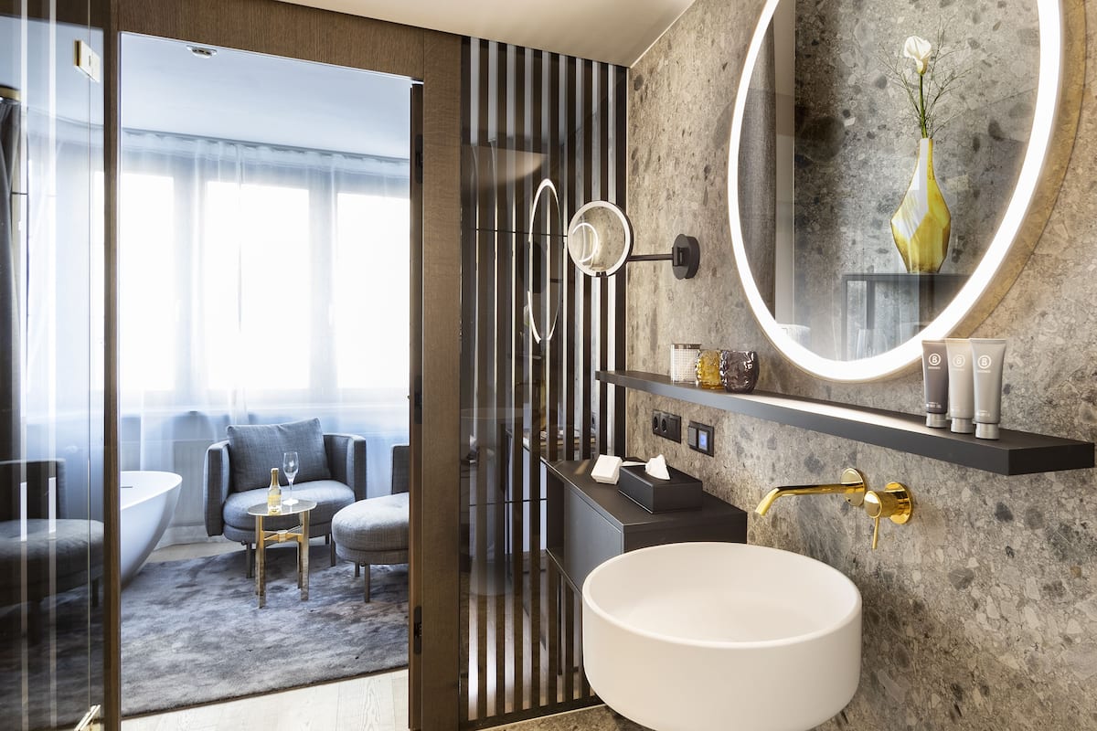 junior suite | bathroom | eco-friendly toiletries, hair dryer, bathrobes, slippers