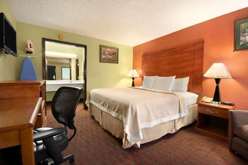 Premium bedding, desk, blackout curtains, iron/ironing board