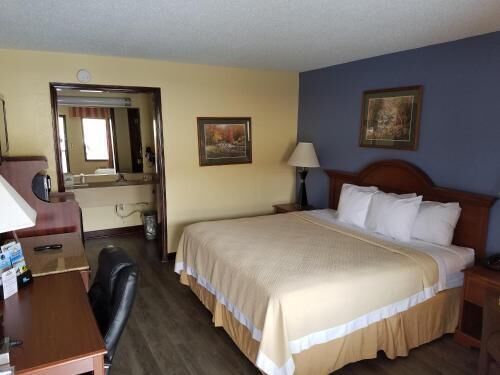 Premium bedding, desk, blackout curtains, iron/ironing board