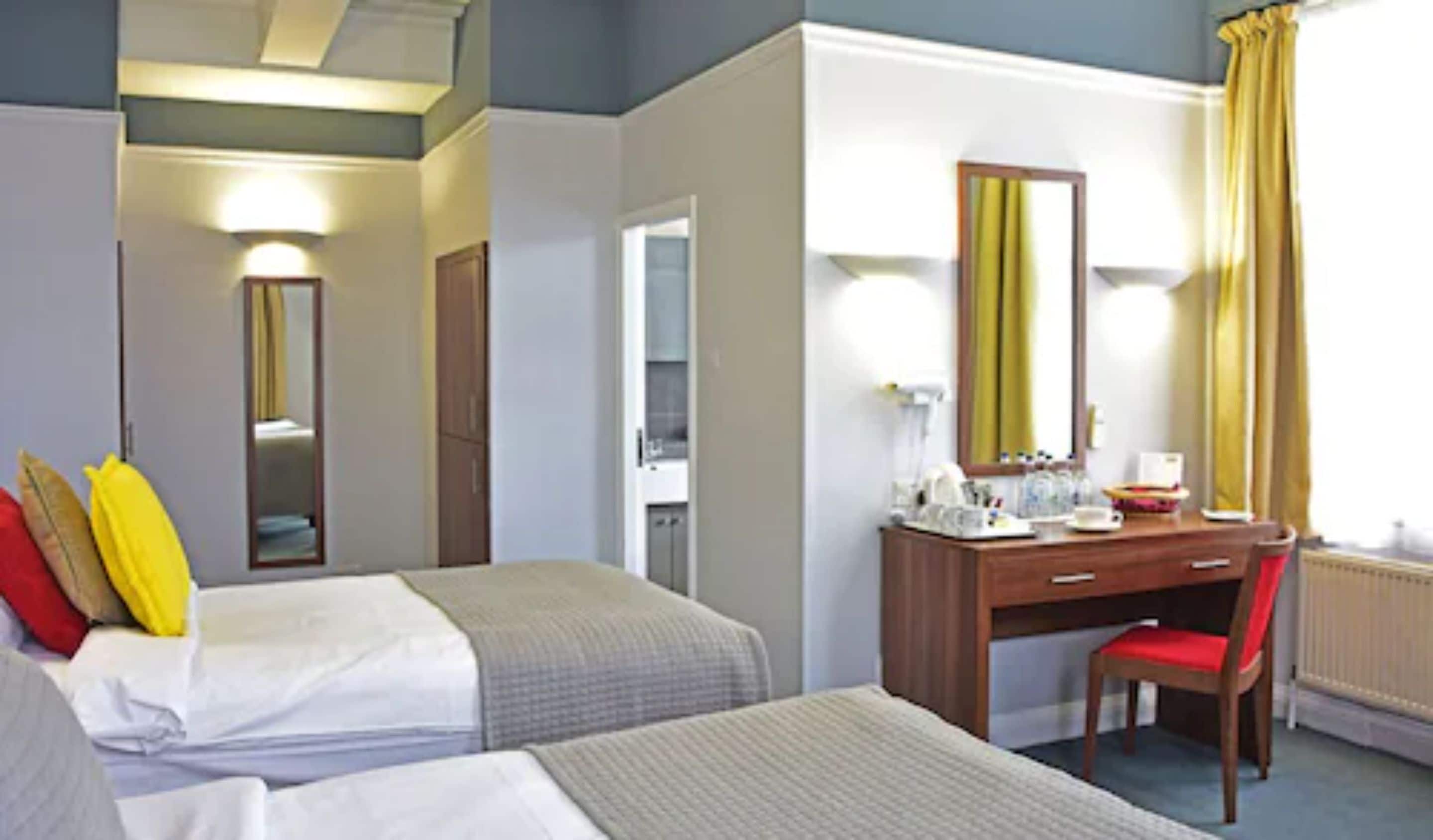 standard triple room | in-room safe, desk, blackout curtains, iron/ironing board