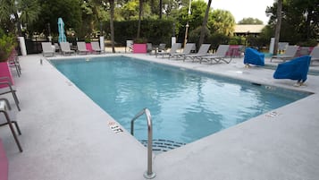Seasonal outdoor pool, open 9:00 AM to 10:00 PM, sun loungers