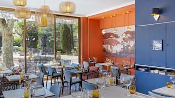 Breakfast, lunch, dinner served; Mediterranean cuisine, garden views