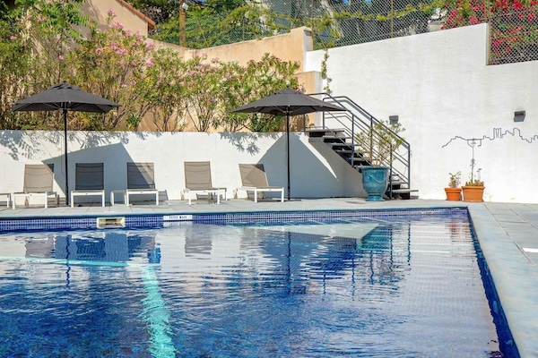 Seasonal outdoor pool, pool umbrellas