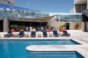 Outdoor pool, open 7 AM to 10:30 PM, sun loungers