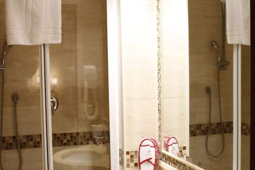 Shower, free toiletries, hair dryer, towels