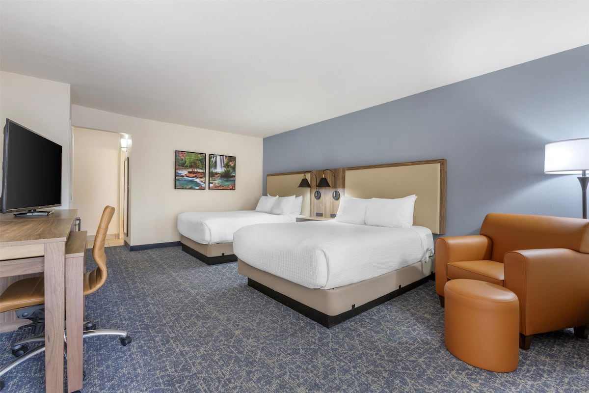 Suite, Multiple Beds, Non Smoking, Refrigerator & Microwave | In-room safe, laptop workspace, soundproofing, iron/ironing board