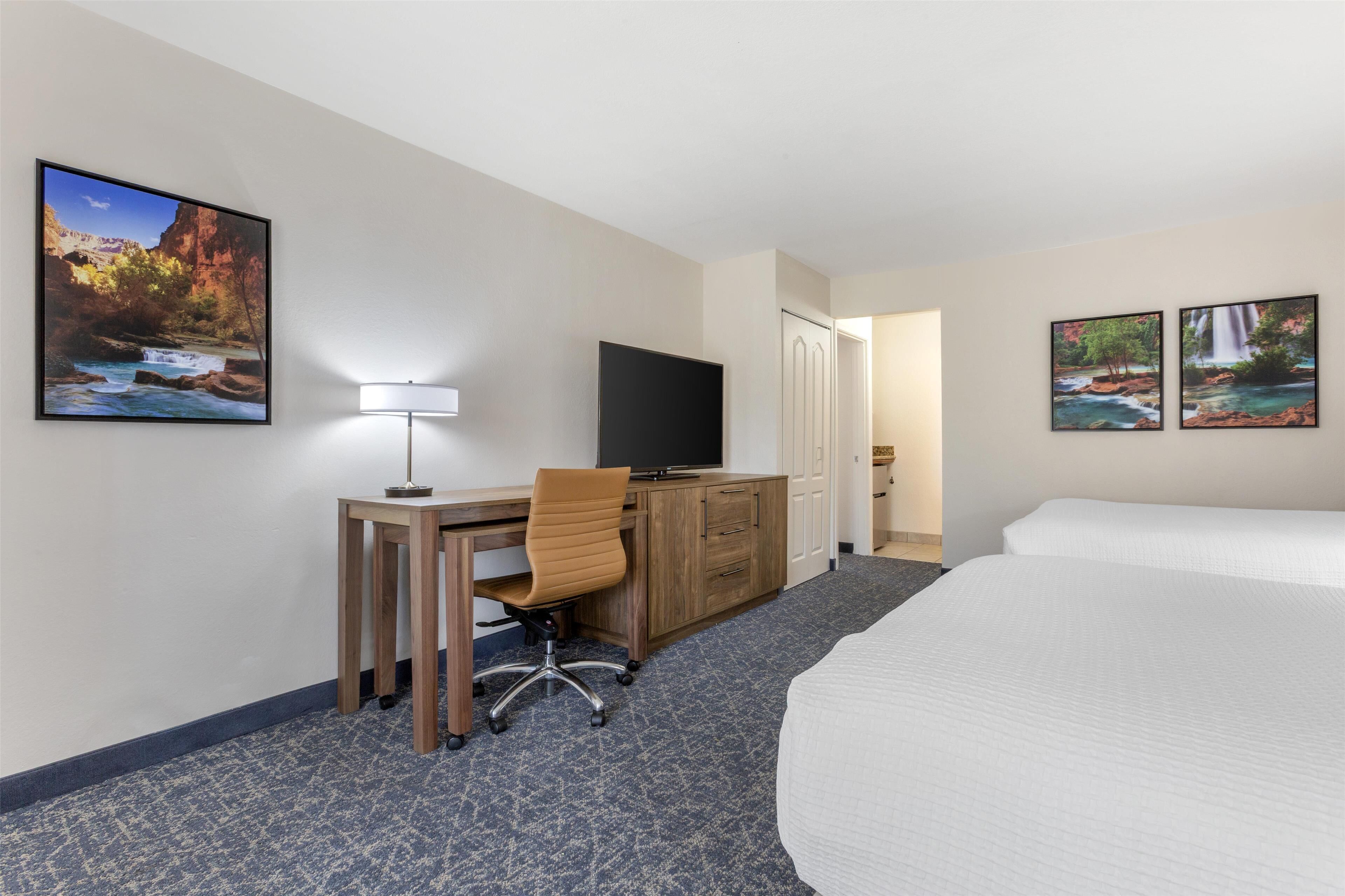 suite, multiple beds, non smoking, refrigerator & microwave | 1 bedroom, in-room safe, laptop workspace, soundproofing