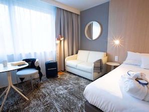 Premium bedding, desk, blackout curtains, soundproofing