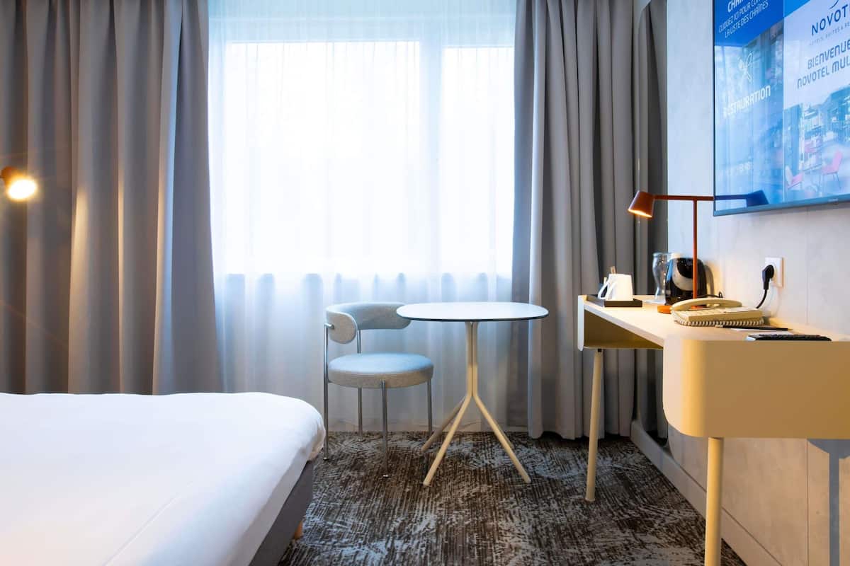 Premium bedding, desk, blackout curtains, soundproofing