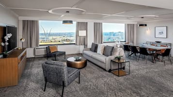 Premium bedding, desk, laptop workspace, iron/ironing board