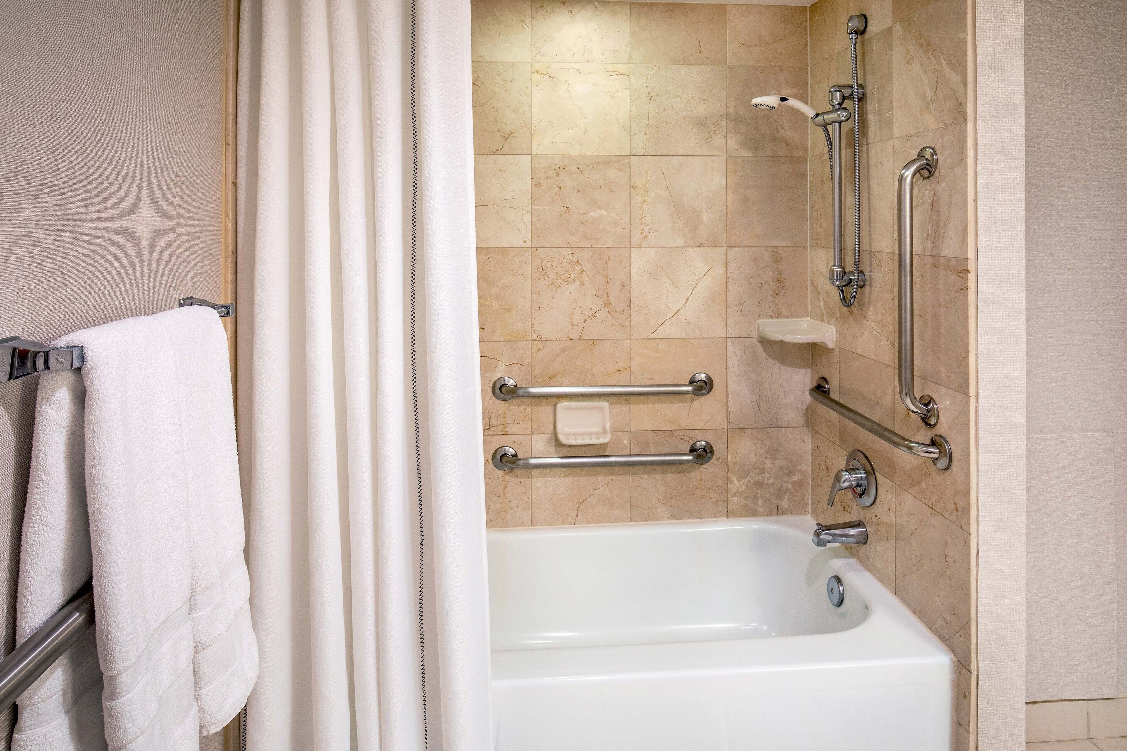 combined shower/bathtub, free toiletries, hair dryer, towels