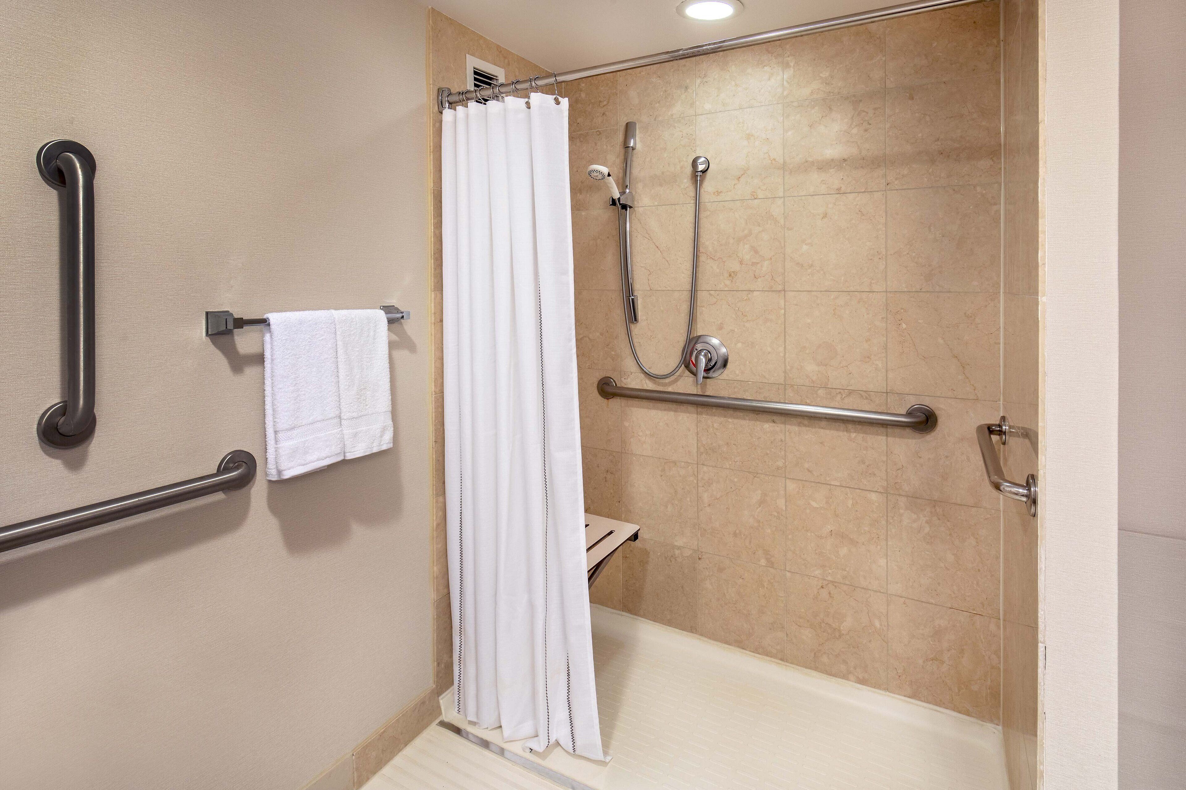 combined shower/bathtub, free toiletries, hair dryer, towels