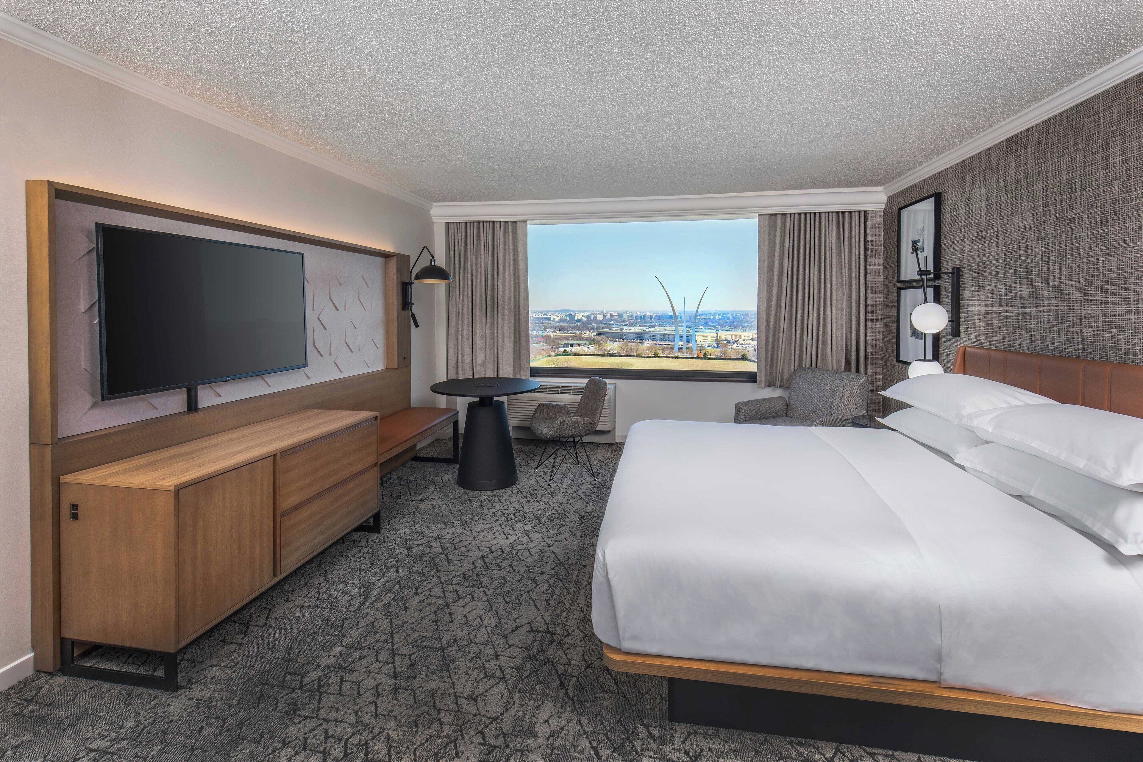 premium bedding, desk, laptop workspace, iron/ironing board