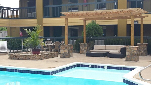 Outdoor pool, open 10:30 AM to 8:30 PM, pool loungers