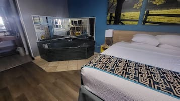 Standard Room, 1 King Bed, Non Smoking, Jetted Tub | In-room safe, desk, blackout drapes, iron/ironing board