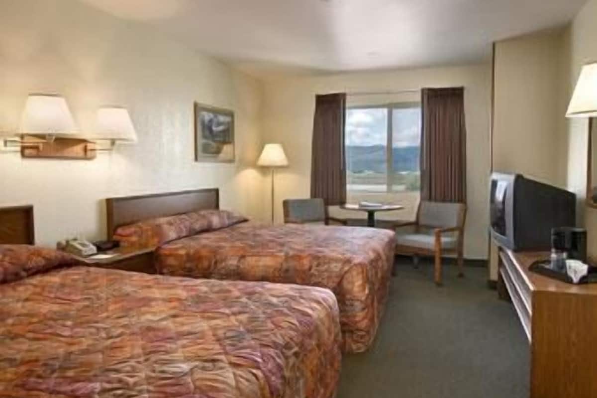 desk, laptop workspace, iron/ironing board, free cots/infant beds