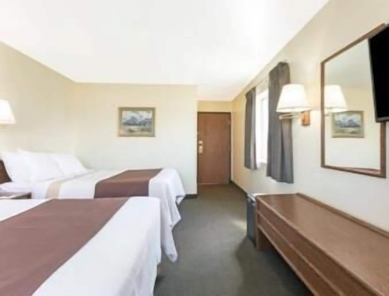 desk, laptop workspace, iron/ironing board, free cots/infant beds