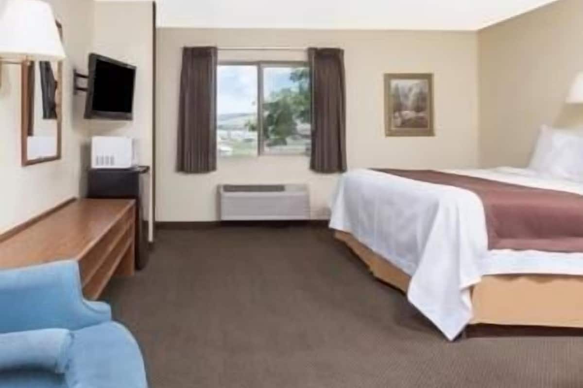 desk, laptop workspace, iron/ironing board, free cots/infant beds