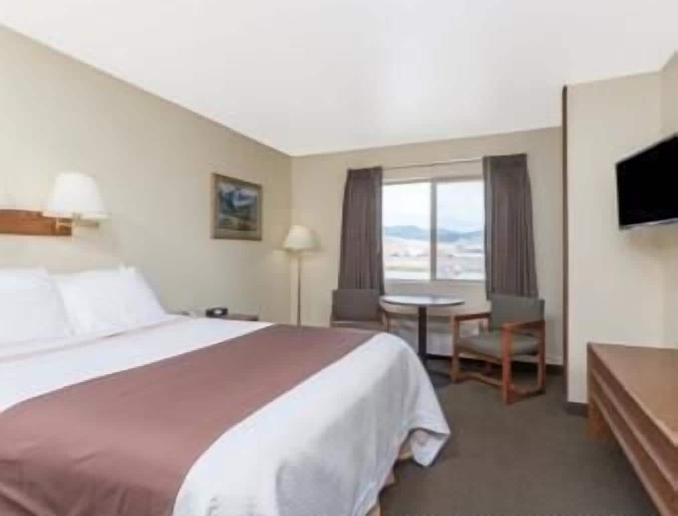 desk, laptop workspace, iron/ironing board, free cots/infant beds