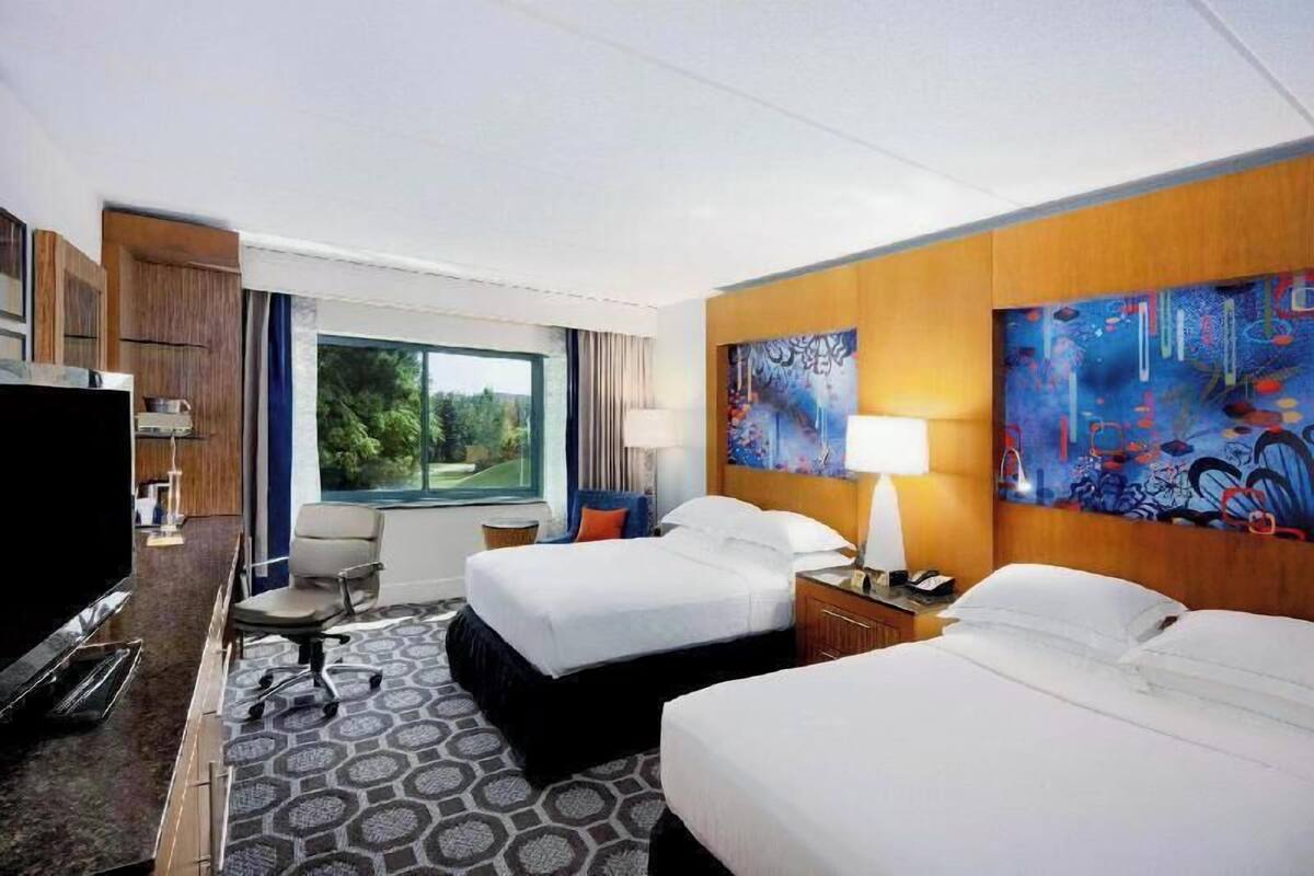 Hypo-allergenic bedding, in-room safe, blackout curtains