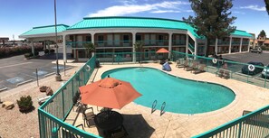 Outdoor pool, open 9:00 AM to 9:00 PM, sun loungers